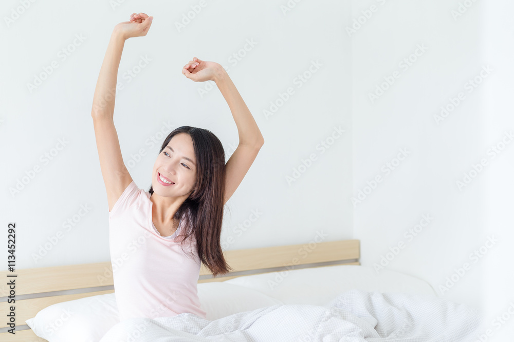 Woman woke up and stretched Woman woke up and stretched