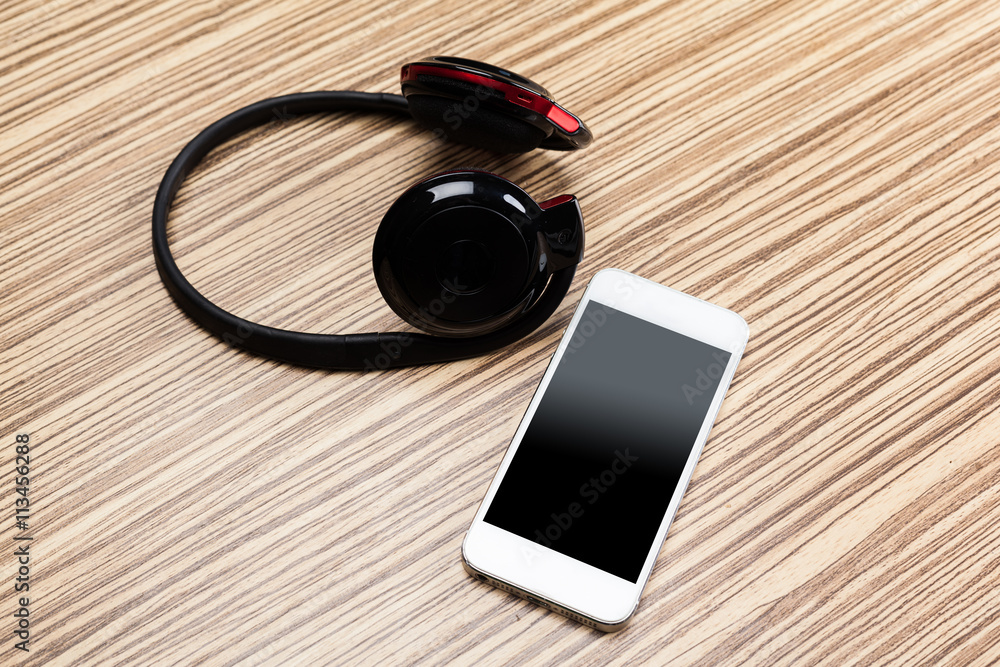 headphones on wooden background headphones on wooden background