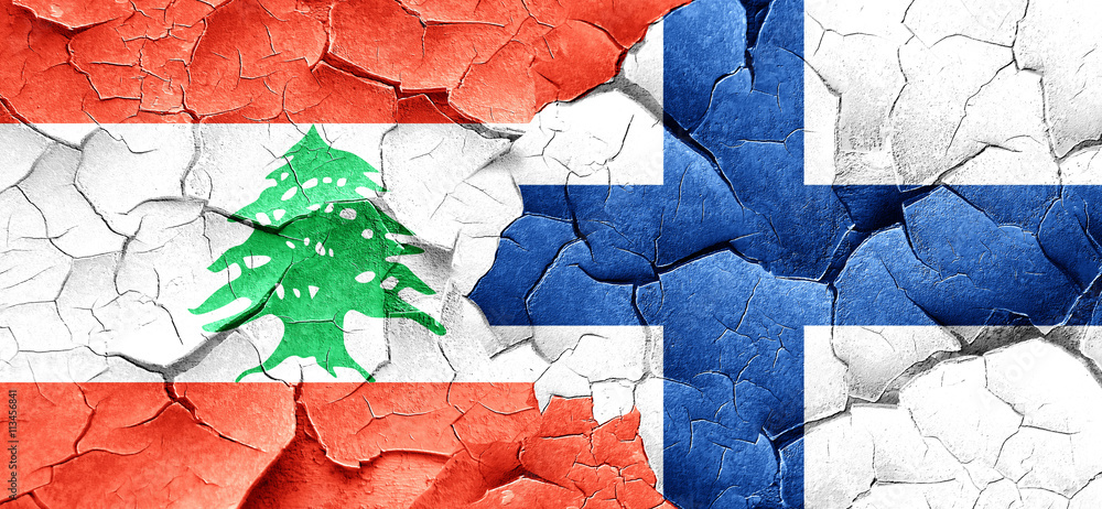 Lebanon flag with Finland flag on a grunge cracked wall