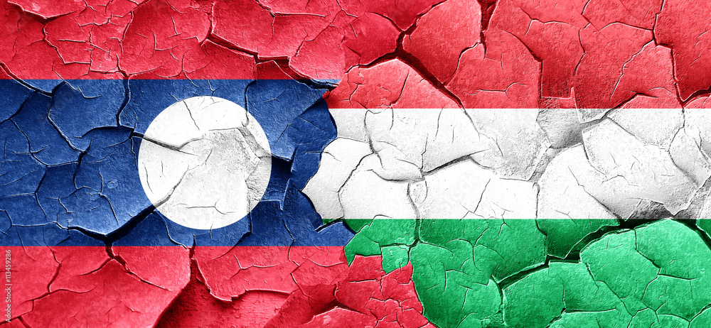 Laos flag with Hungary flag on a grunge cracked wall