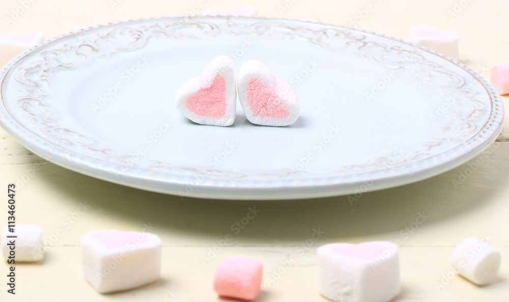 pair of heart marshmallow on a plate valentines day love romantic background