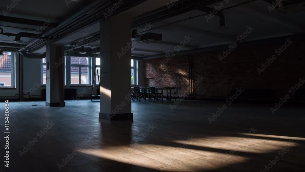 Time-lapse of sun rays moving over an empty rustic office space Time-lapse of sun rays moving over an empty rustic office space