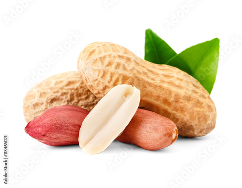 Peanuts and shell  with green leaf. Isolated on a white background.