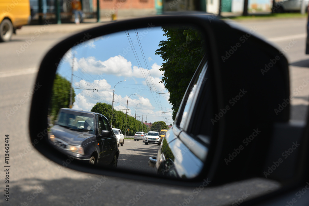 in the mirror of car
