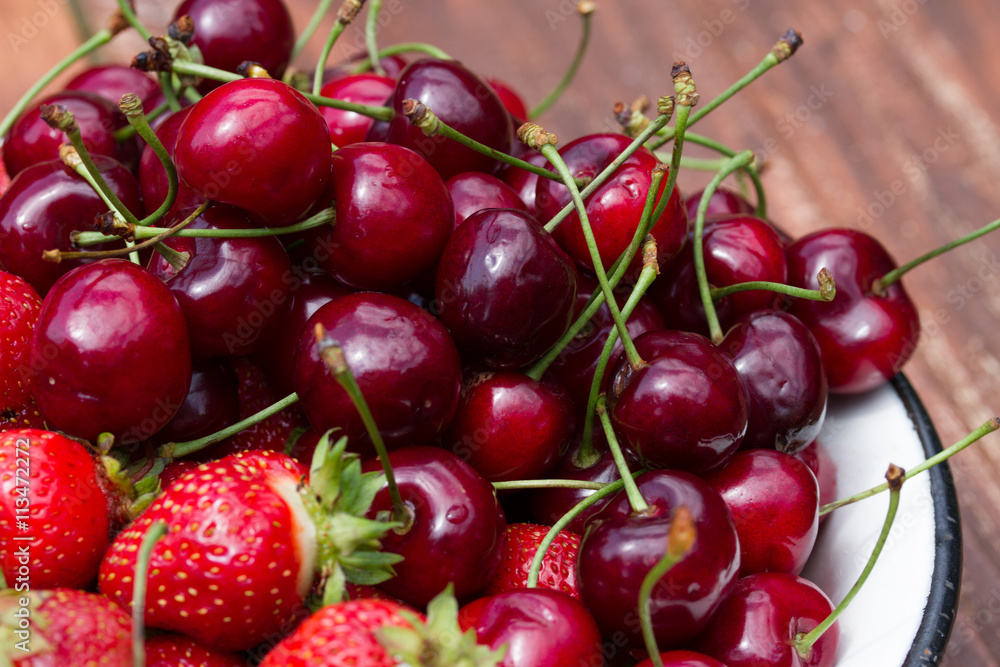 fresh sweet strawberry and cherry in the bowl fresh sweet strawberry and cherry in the bowl