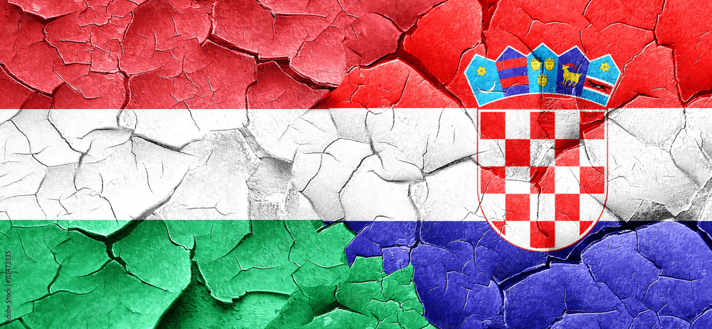 Hungary flag with Croatia flag on a grunge cracked wall