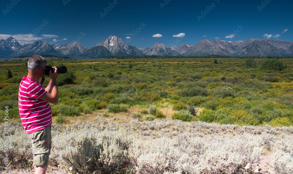 Fototapeta premium Photographer in Grand Teton National Park, Wyoming