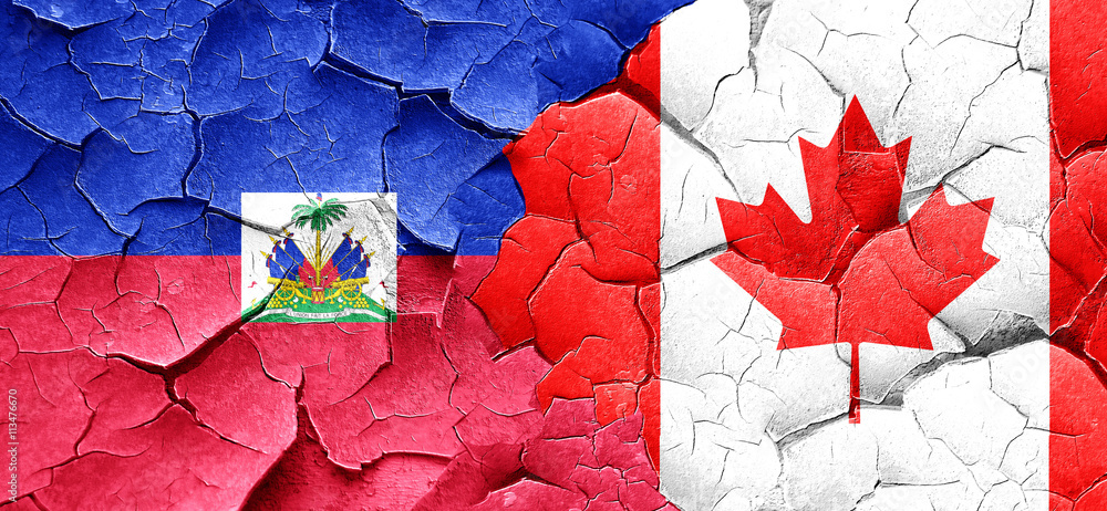 Haiti flag with Canada flag on a grunge cracked wall