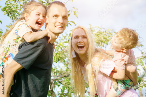 Portrait of a happy family outdoors