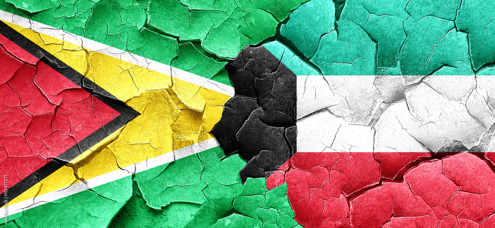 Guyana flag with Kuwait flag on a grunge cracked wall