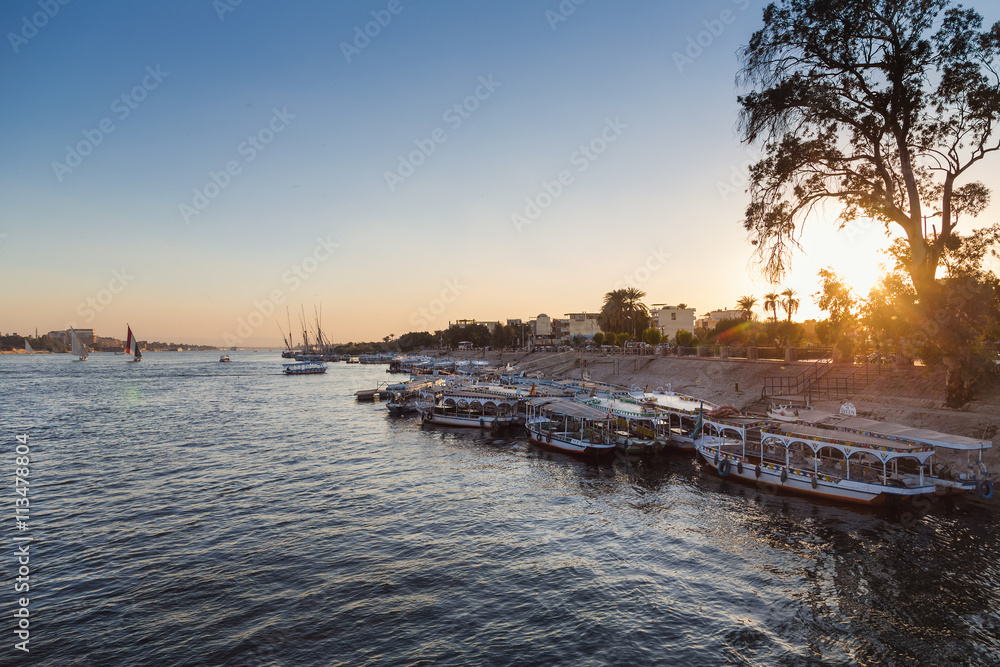 LUXOR, EGYPT - FEBRUARY 11, 2016: Tourist boats at Luxor waterfront.