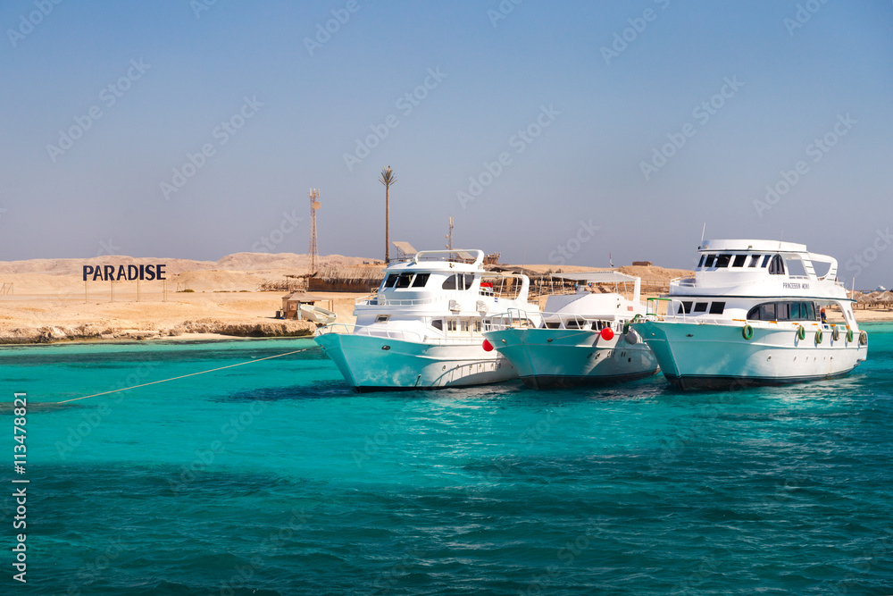 HURGHADA, EGYPT - FEBRUARY 12, 2016: Boats docked at Paradise Island.