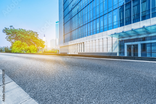 clean road with modern buildings background © kalafoto