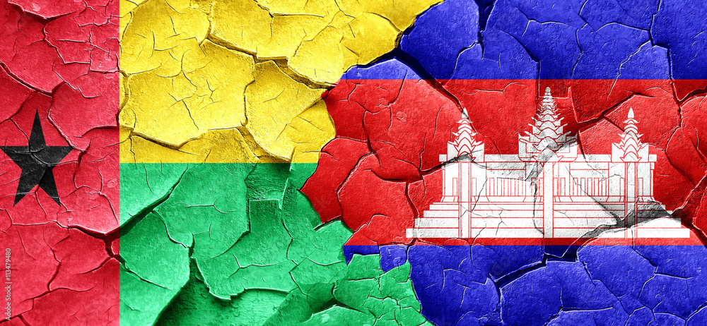 Guinea bissau flag with Cambodia flag on a grunge cracked wall