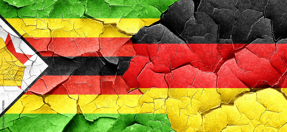 Zimbabwe flag with Germany flag on a grunge cracked wall