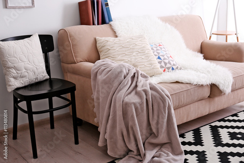 Beige sofa in the room inte...