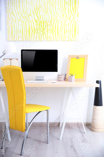 Stylish workplace with comp...