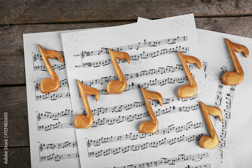 Golden music notes and shee...