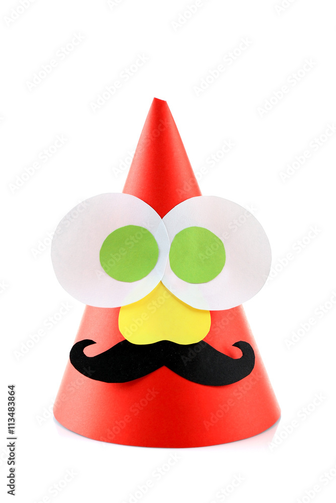 Funny birthday cap with decorative eyes isolated on white Funny birthday cap with decorative eyes isolated on white