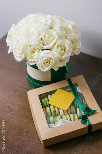 Canvas Print Rich bunch of pink eustoma and roses flowers, green leaf in hand Fresh spring bouquet