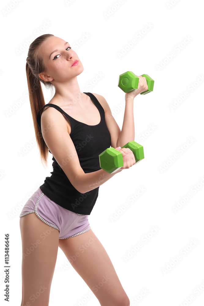 Young sporty girl with dumbbells Young sporty girl with dumbbells