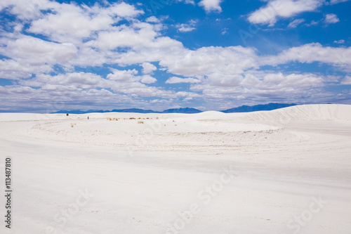 Beautiful cinematic deserted nature view under the blue cloudless sky in America. White sands.