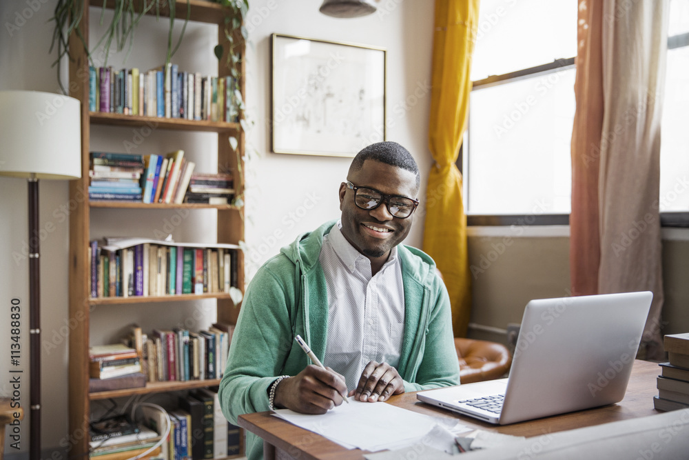 Portrait of happy man working at home Portrait of happy man working at home