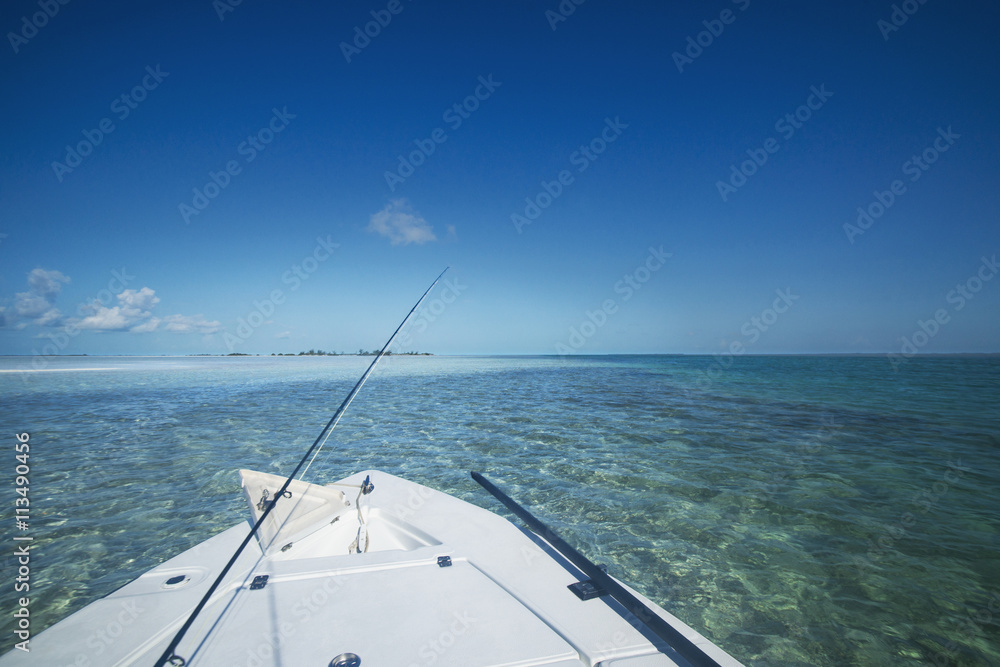 Boat moving on sea against blue sky Boat moving on sea against blue sky