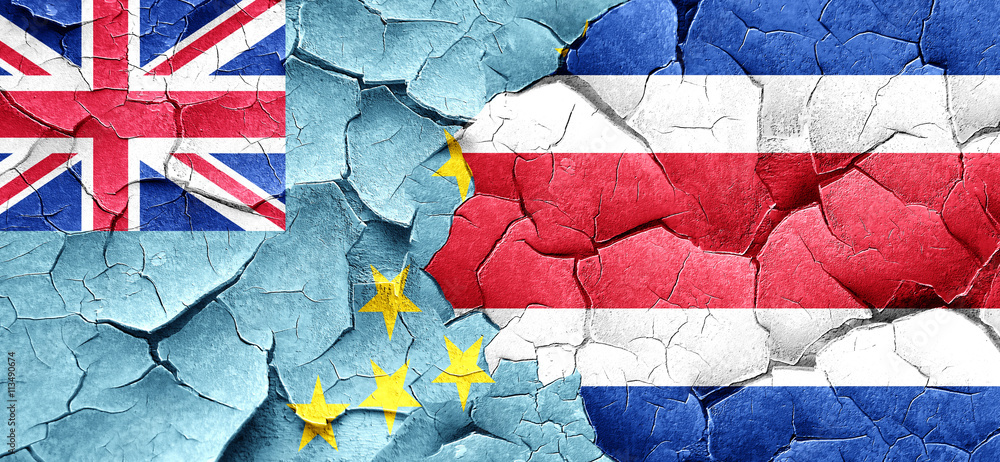 Tuvalu flag with Costa Rica flag on a grunge cracked wall Tuvalu flag with Costa Rica flag on a grunge cracked wall