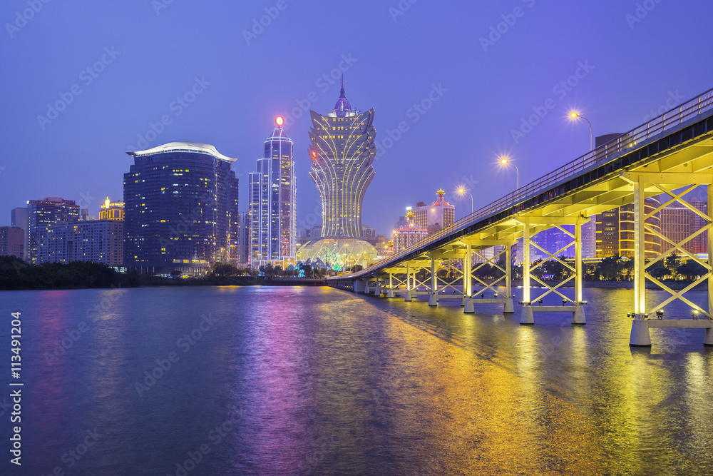 Building and the skyline of Macau city at night