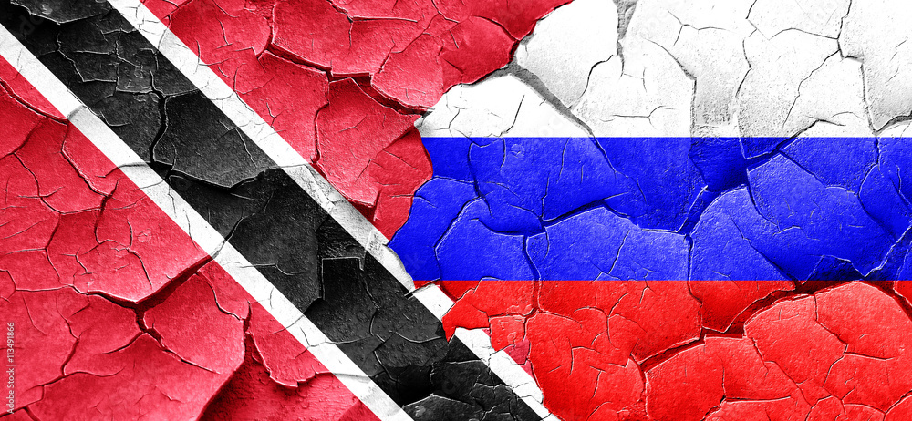Trinidad and tobago flag with Russia flag on a grunge cracked wa