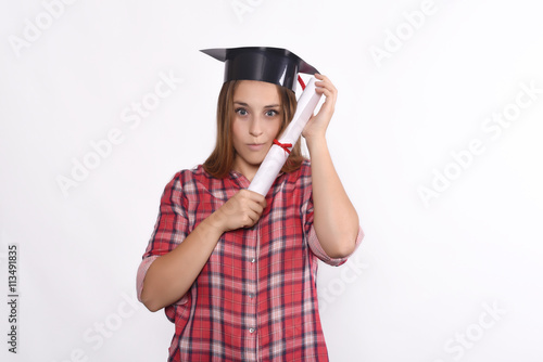 Student with diploma and graduation cap