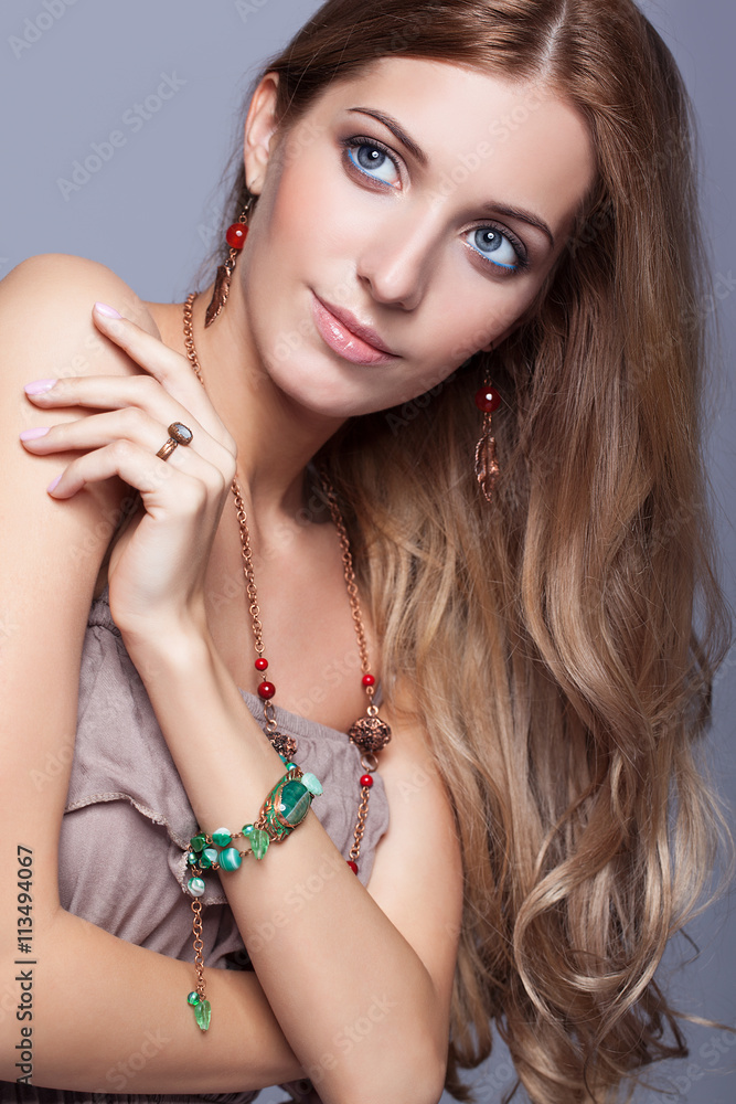 Beautiful woman in jewelry and  bijouterie