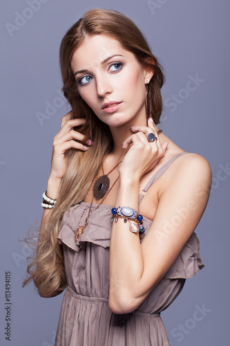 Beautiful woman in jewelry and bijouterie