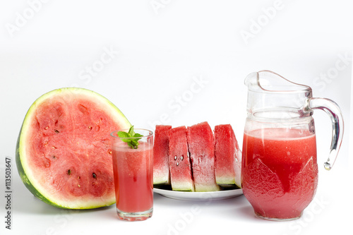 Close-up of fresh watermelon juice isolated on white background