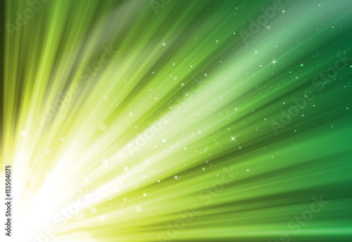 Yellow and green glitter sparkle defocused rays lights bokeh abstract background.