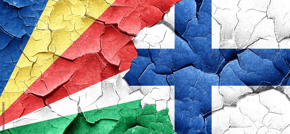 seychelles flag with Finland flag on a grunge cracked wall