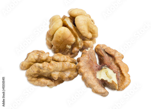 Several shelled kernels of walnuts closeup