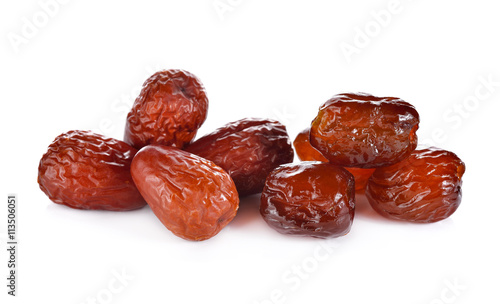 dried and sweetened Jujube fruite on white background