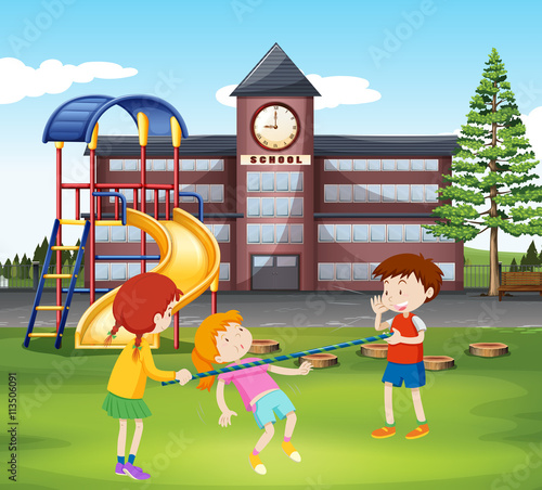 Children playing with bar in the playground