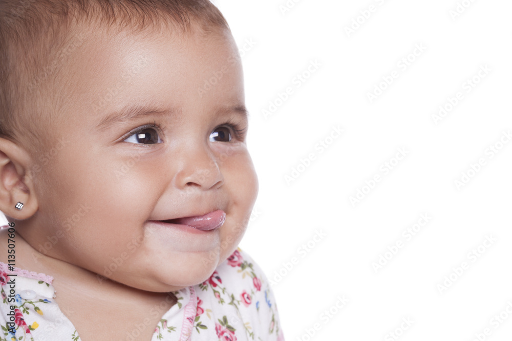 Portrait of lovely baby girl sticking tongue out Portrait of lovely baby girl sticking tongue out