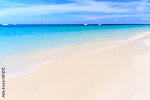 tropical white sand beach clear water with blue sky,Phuket Thail © Atip R
