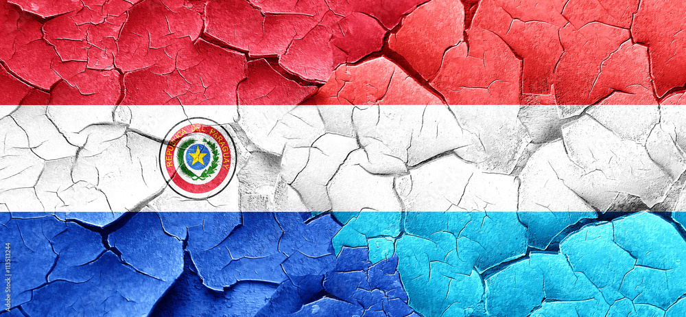 Paraguay flag with Luxembourg flag on a grunge cracked wall