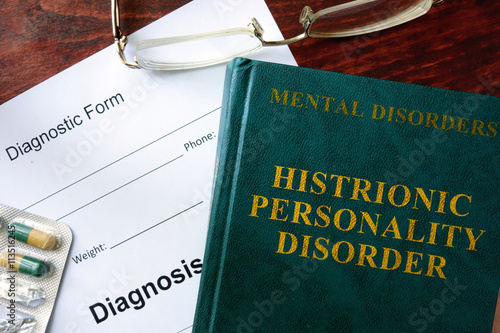 Histrionic personality disorder concept. Diagnostic form and book on a table.