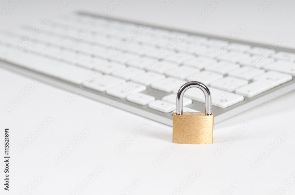 Internet security concept with padlock protecting computer Internet security concept with padlock protecting computer