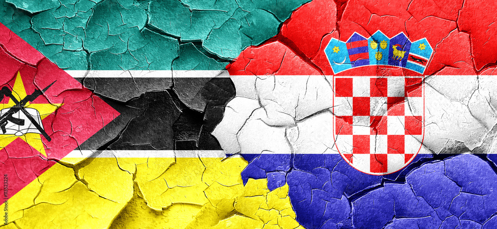 Mozambique flag with Croatia flag on a grunge cracked wall