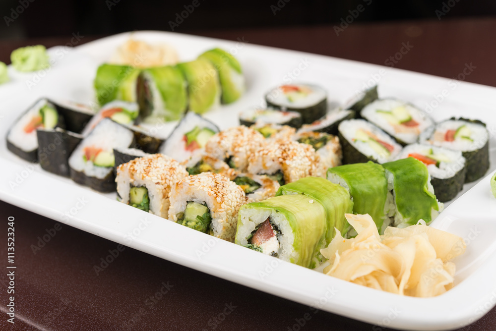 sushi rolls on white plate sushi rolls on white plate
