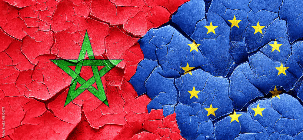 Morocco flag with european union flag on a grunge cracked wall