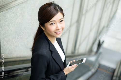 Businesswoman use of mobile phone