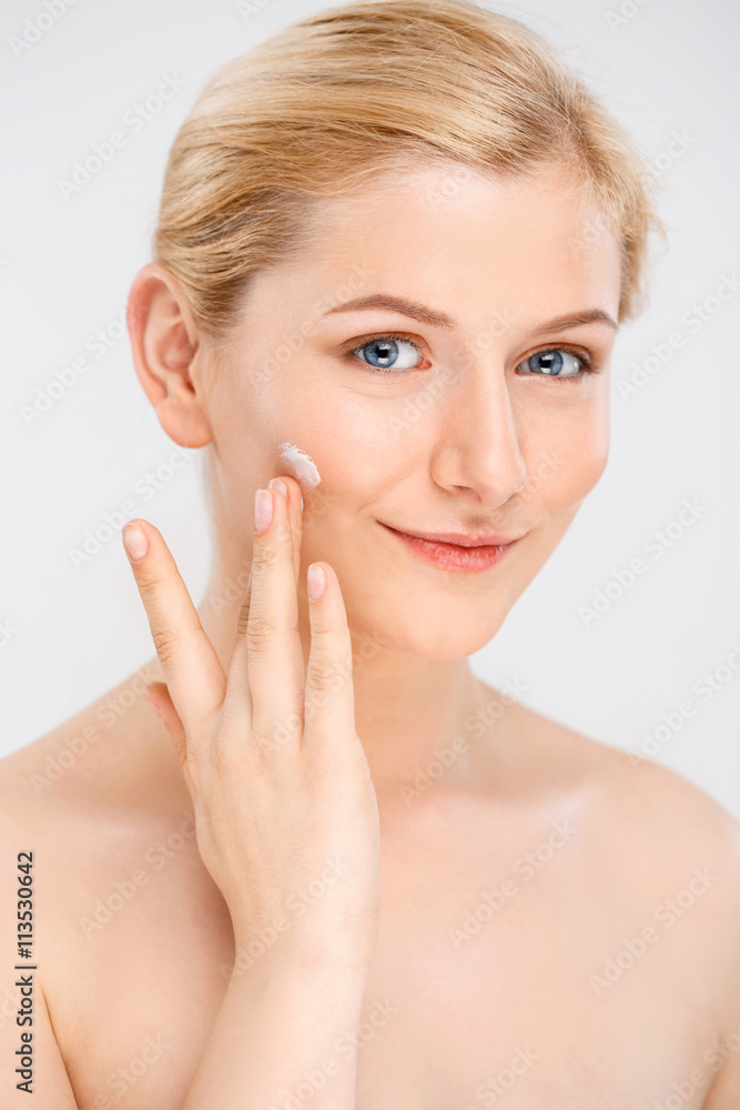 Portrait of young pretty girl over white background. Portrait of young pretty girl over white background.